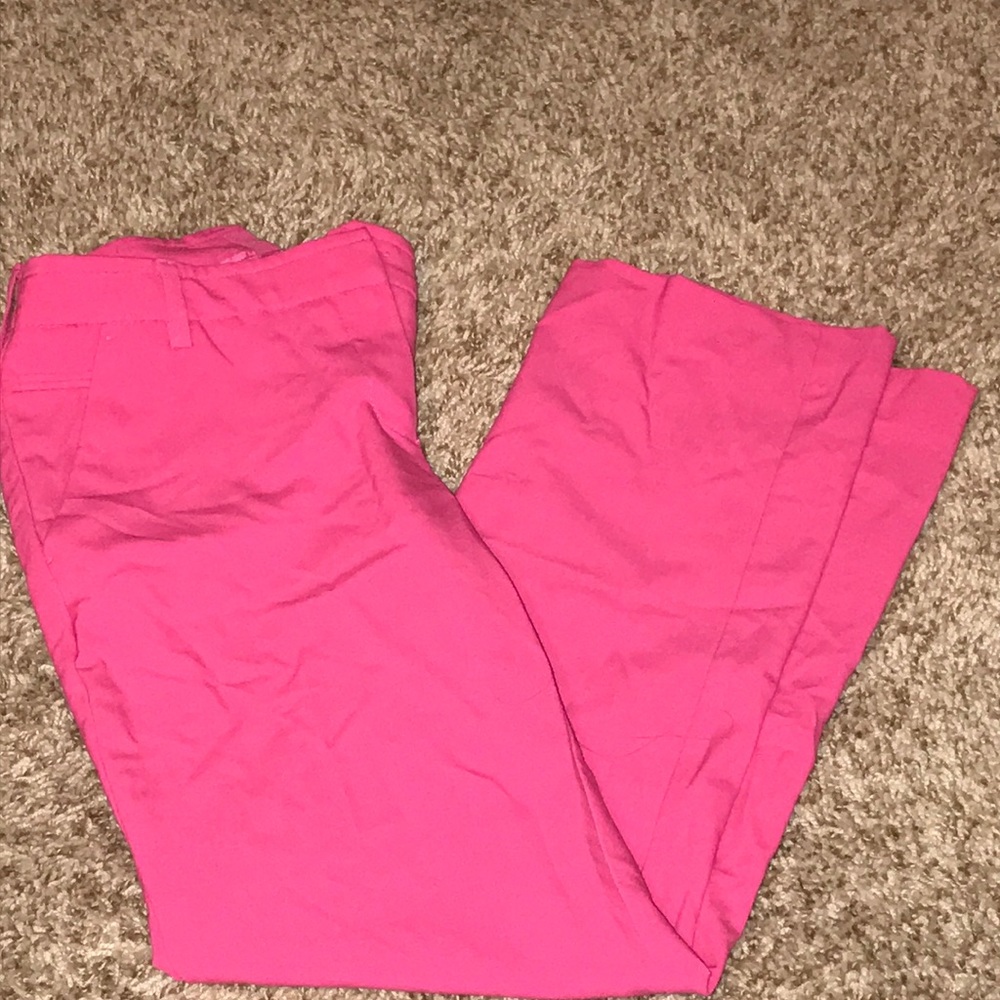 Hot pink suit pants have not been worn
